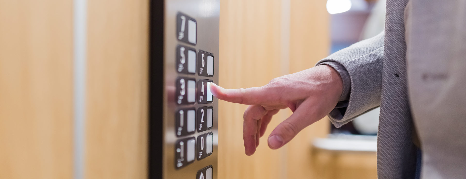 Pressing elevator floor button